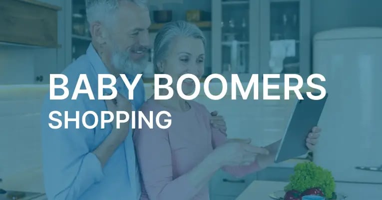 An older man and woman look at a tablet together in a kitchen, with the text Baby Boomers Shopping overlaid on the image.